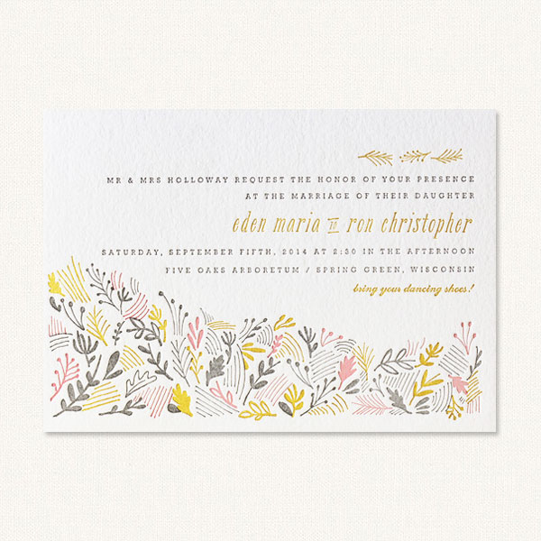 Country themed wedding invitations with letterpress printing and country florals.