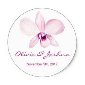 Round 1.5 inch sticker with purple orchid water design with bride and groom names in script font and wedding date.