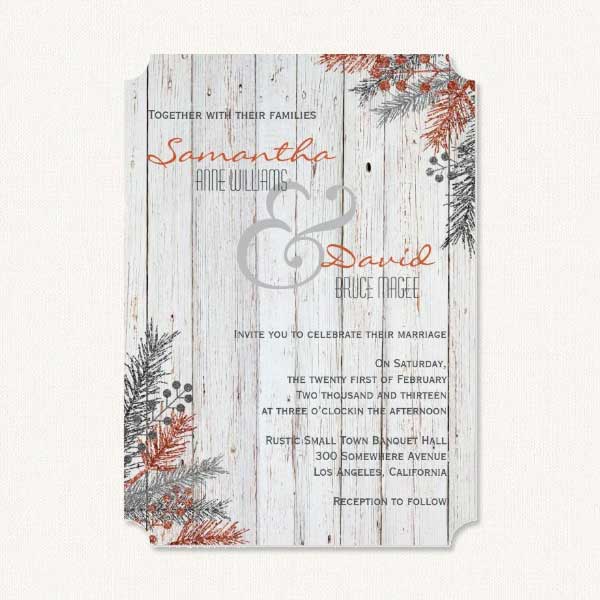 Winter rustic wedding invitations with rustic white washed wood and winter sprigs.